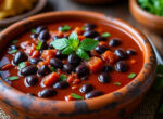 découvrez la recette traditionnelle congolaise de madesu (mahalagi), des haricots noirs mijotés lentement dans une savoureuse sauce tomate, parfaite pour un repas gourmand et authentique.
